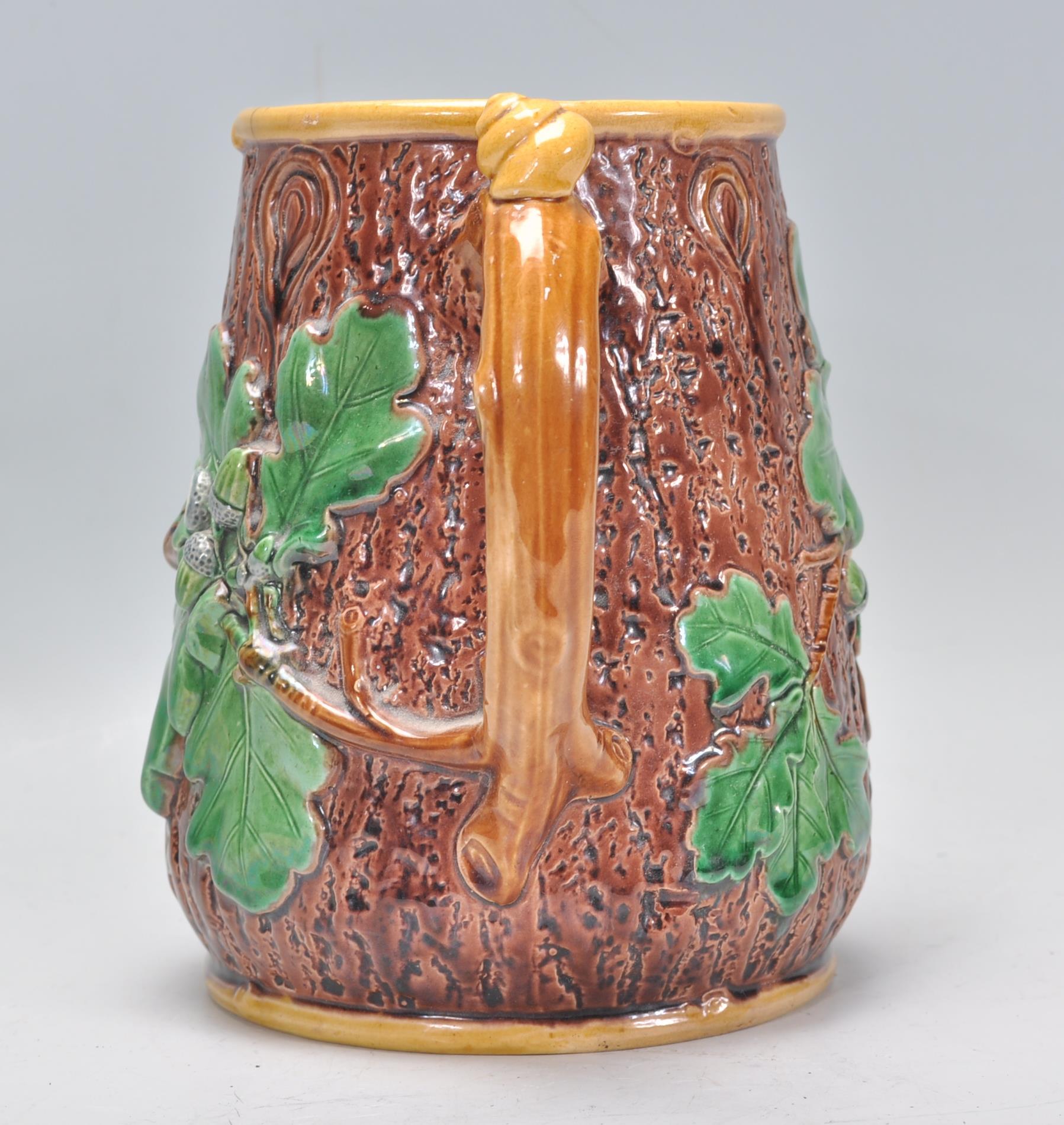 A 19th Century Victorian Mintons Majolica oak jug having a tree bark effect to the exterior with - Image 4 of 6