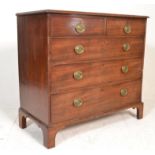 A Georgian 19th century mahogany chest of drawers. Raised on bracket feet having 2 short drawers