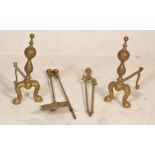 A 19th century Victorian brass fireside companion set comprising shovel, tongs and poker, all with