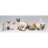 A group vintage 20th Century Beswick ceramic cats to include Siamese cat examples, Persian cats etc.