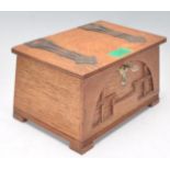 A good 1920's oak and brass bound Arts & Crafts casket box in the manner of Archie Knox. The