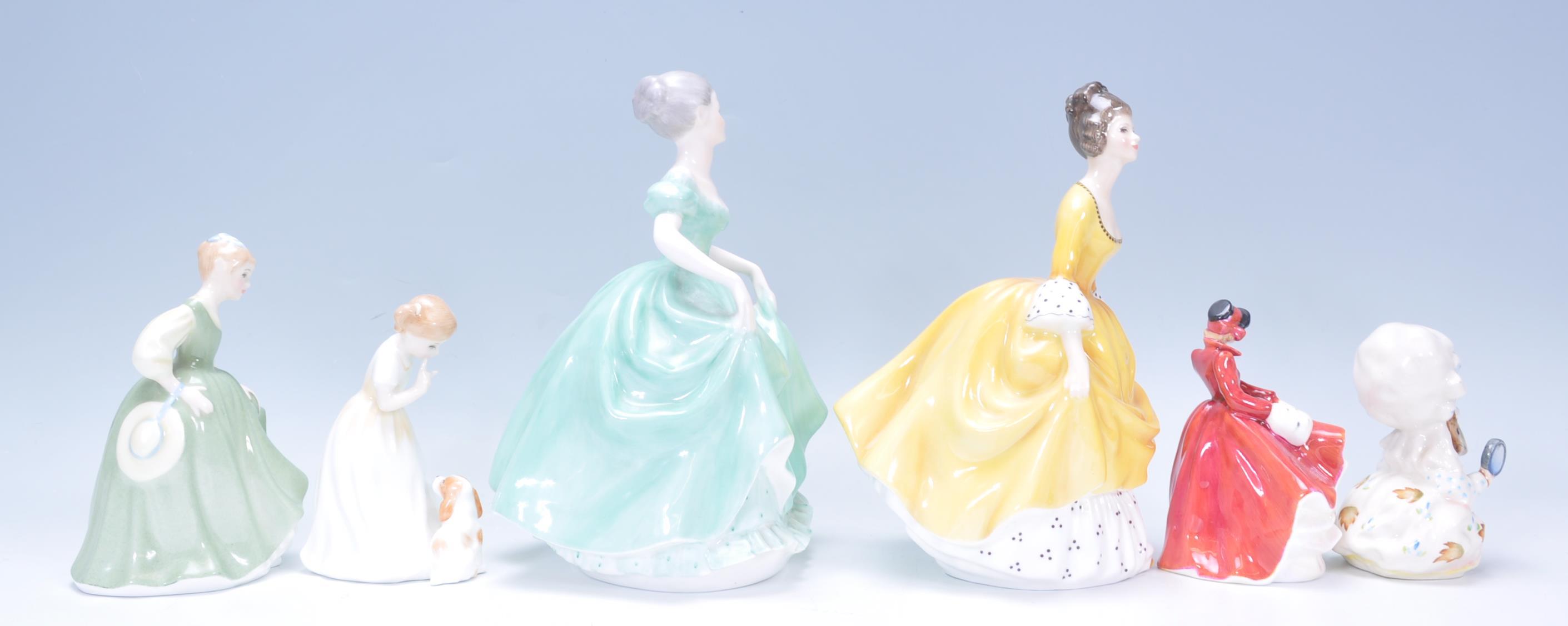 A mixed collection of ceramic figurines to include three Royal Doulton ladies one Emma HN 3208, - Image 2 of 8