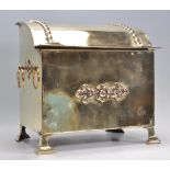 A good Edwardian early 20th century brass fireside coal box / log box with side carrying handles,