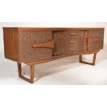 A good mid 20th Century 1960's melamine / formica sideboard credenza having a central bow fronted