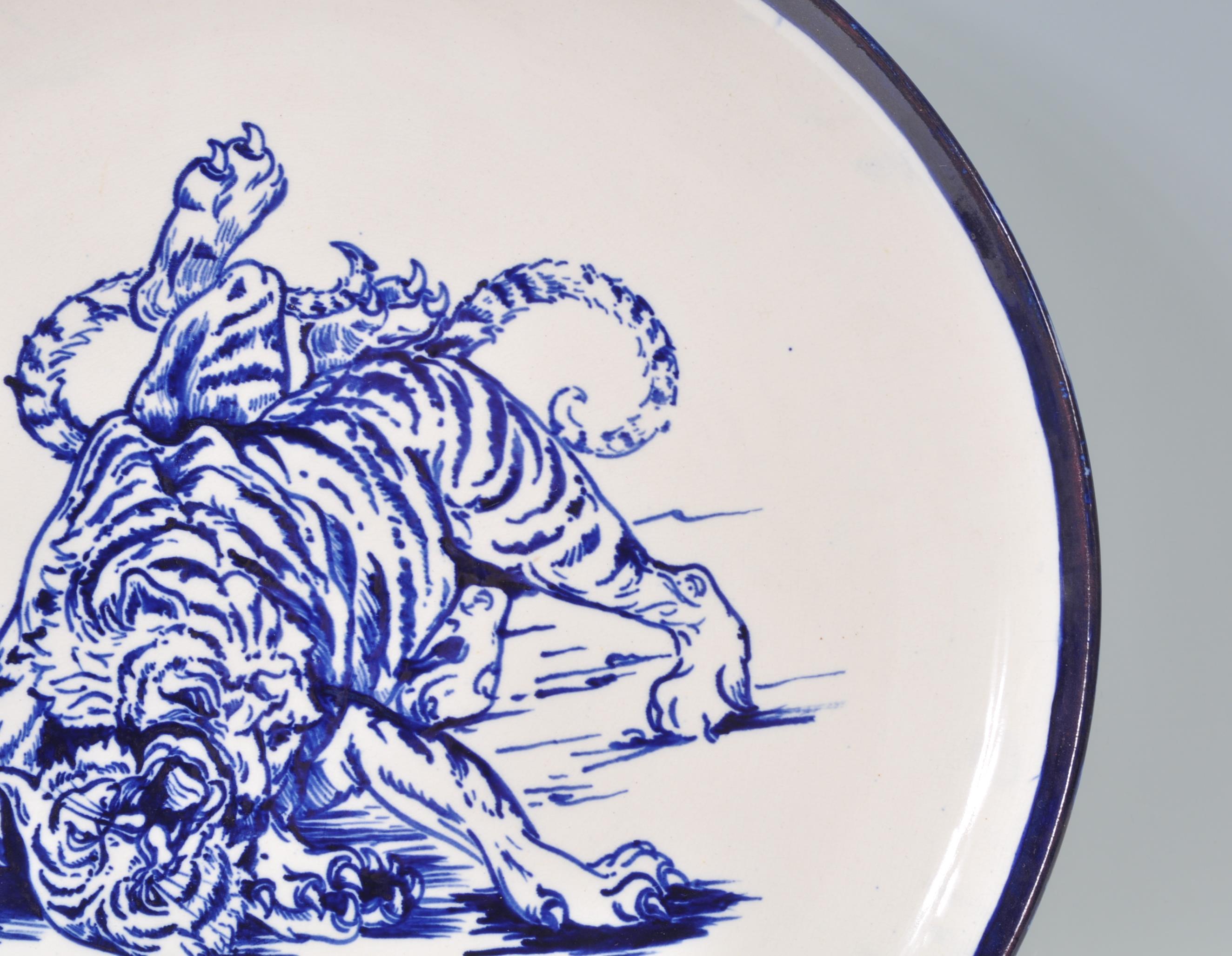 A large early 20th Century English blue and white charger plate in the manor of Frederick Rhead - Image 6 of 9