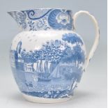 An early 19th century Georgian Pearlware / Pearl Ware large blue and white jug having unusual