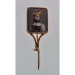 A late 19th / early 20th Century 18ct gold lapel pin having a square panel enamelled with a portrait