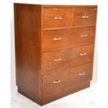 A mid century Air Ministry oak and red composite ( original ) top chest of drawers belonging