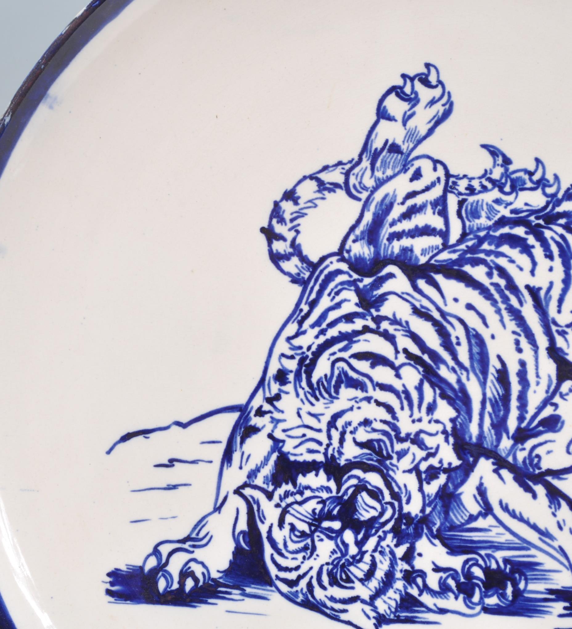 A large early 20th Century English blue and white charger plate in the manor of Frederick Rhead - Image 5 of 9