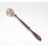 A 20th Century silver hallmarked candle snuff with gadrooned rim having a turned wooden handle.