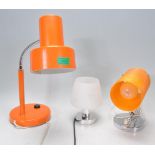 A collection of retro 20th century lights to include a 1970's orange table top spot light, fibr spun