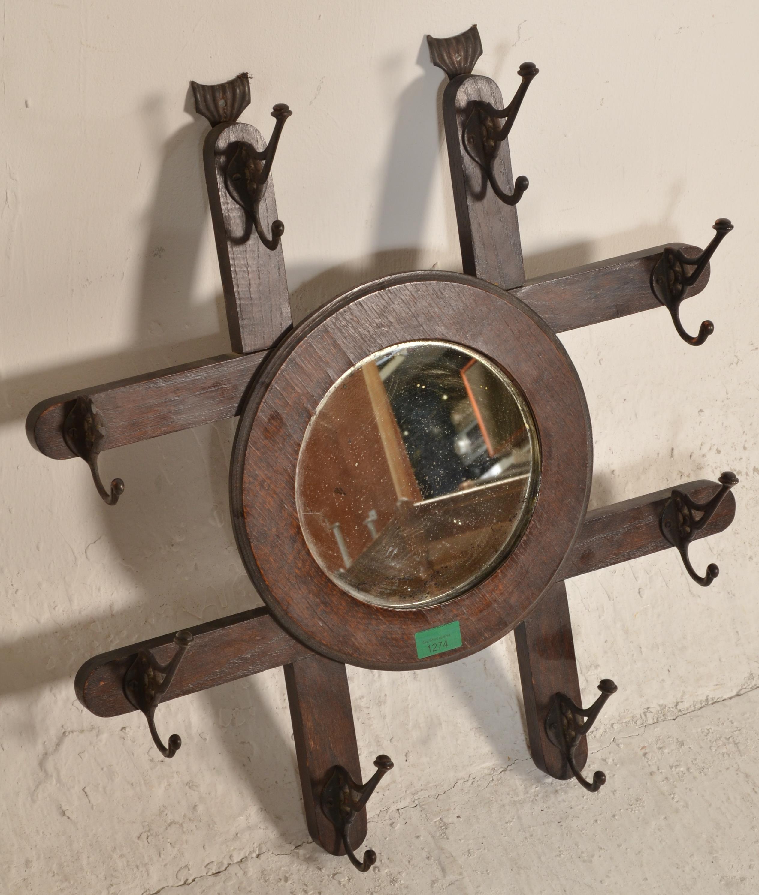 A late 19th century Victorian Arts & Crafts wall mirror coat rack combination. The roundel mirror on - Image 2 of 6