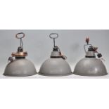 A set of 4 vintage mid century photographic lamps of space age form having half sphere shades