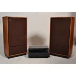 A large pair of 20th century teak cased Tannoy Cheviot floor standing hi-fi speakers. Each of