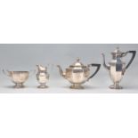 A Sheffield hallmarked silver 4 piece service by Mappin & Webb  Sheffield & London. Hallmarked for