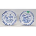 Two 18th Century Chinese blue and white plates of octagonal form decorated with bamboo and stones in