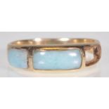 A stamped 14ct gold ring set with blue stone panels to the head. Weight 2.2g. Size N. Please note