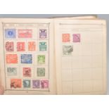 A good early 20th century Lincoln stamp albums to include 19th and 20th century examples including a