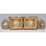 A pair of miniature mid 20th century continental Swiss oil paintings in oval mounts signed  to