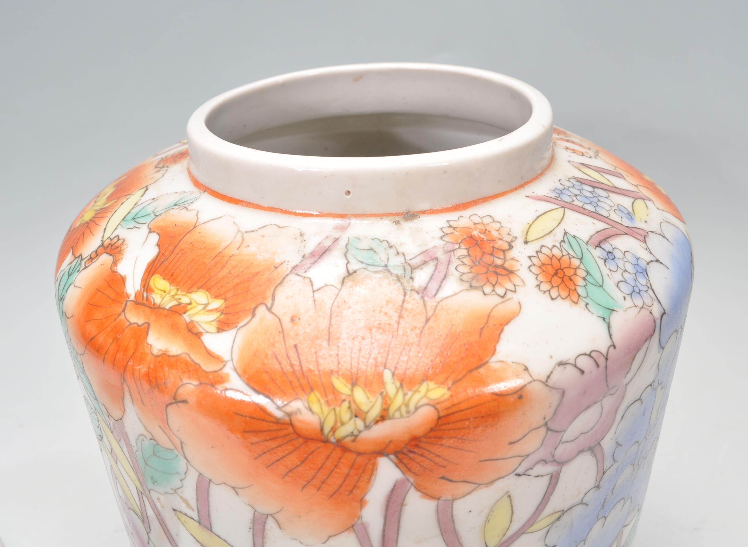 A large early 20th Century Chinese ginger jar of cylindrical form having hand painted floral sprays. - Image 6 of 6