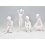 A collection of four German Kaiser porcelain ceramic bisque figurines in the form of nude women,