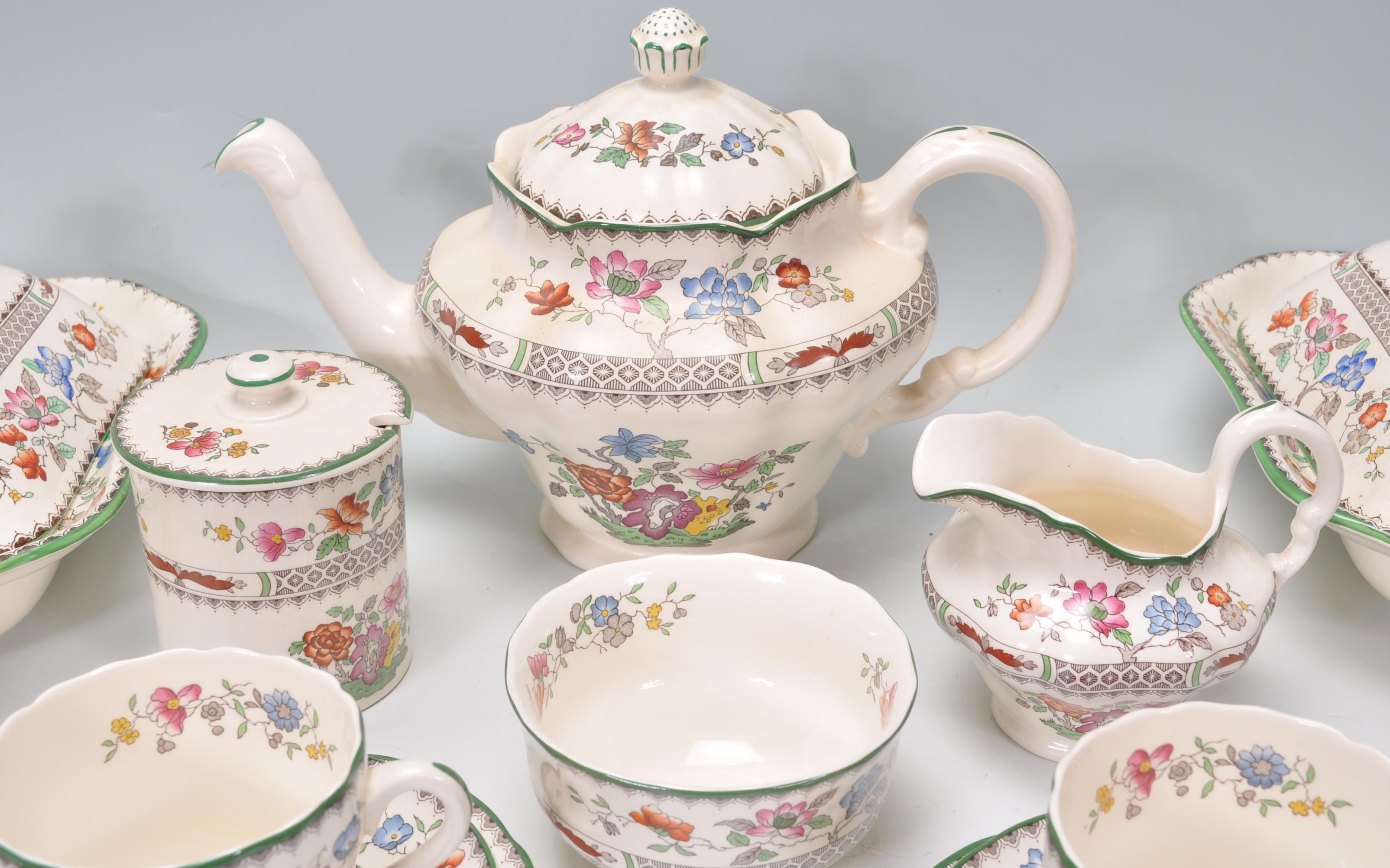 A vintage Spode Chinese Rose pattern six person tea service to include a teapot, sugar bowl, jam - Image 5 of 10