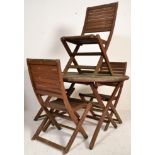 A 20th Century weathered teak folding garden table