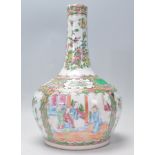 A 19th Century Chinese Canton bottle vase having a bulbous base with a tapering neck, the sides