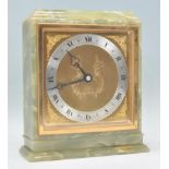 A mid century Mappin & Webb Elliott mantel clock in alabaster green veined case with silvered