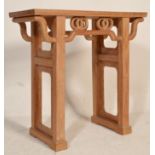 A 20th century republic period Chinese hardwood altar table with roundel pierced apron having square