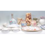 A mixed collection of ceramics dating from the 19th Century to include a Poonah serving plate with