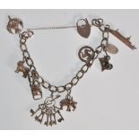 A vintage 20th Century English hallmarked silver chain bracelet having a curb link chain with a