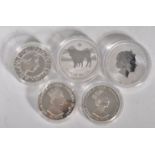 A group of five silver proof coins to include a coronation jubilee five pounds coin, a year of the