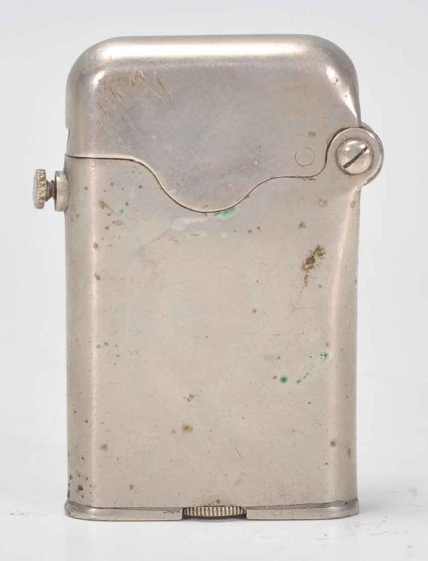 A vintage early 20th Century Thorens Swiss made lighter. Stamped to base Brit. PAT January 29. - Image 3 of 7