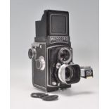 A vintage Micro Precision Products Microcord TLR camera having Ross of London 7.5mm lenses
