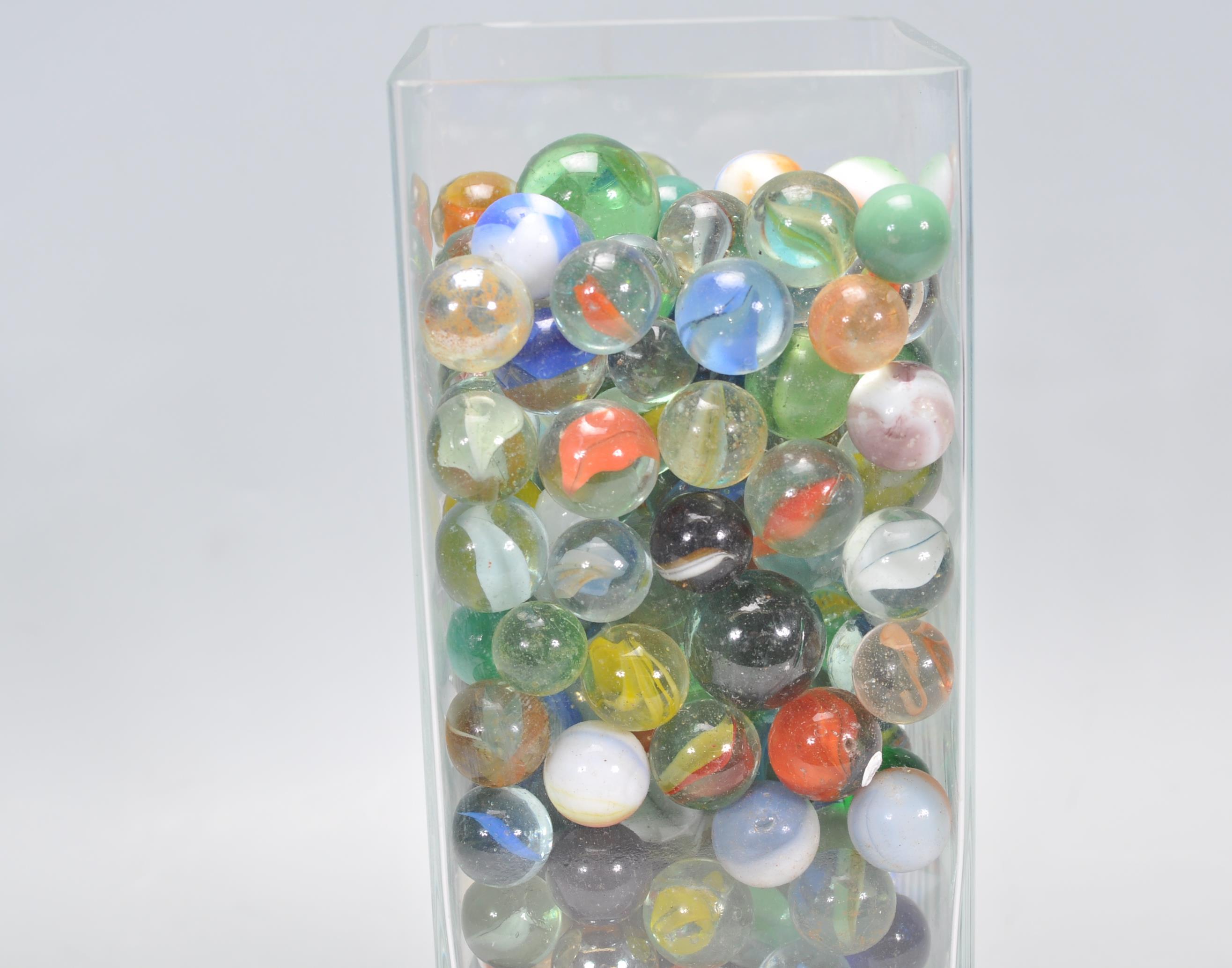 A collection of marbles to include glass cats eye marbles, some white and coloured glass examples, - Image 5 of 11