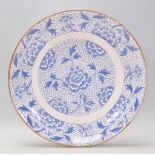 A Chinese 19th century Kang-xi large blue and white charger plate with geometric all over design