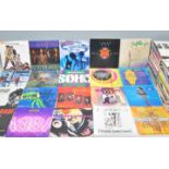 A collection of 1990's vinyl singles 45's RPM records. Various artists and bands to include