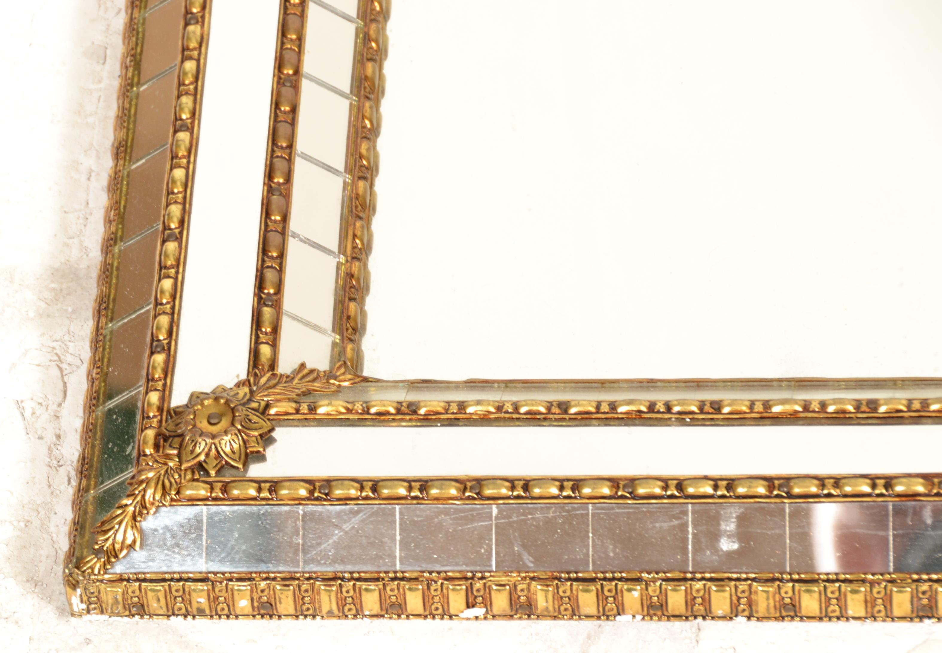 A 20th century Venetian gilt mirror of arched form with cushion border adorned qwith multiple mirror - Image 4 of 7