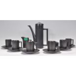 A retro 1970's black glazed coffee service by Ellgreave of England. The set comprising coffee pot,