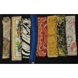 A group of eight vintage Richard Allen designer silk scarves in a wide selection of prints and