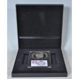 A Queen Elizabeth II 90th birthday silver 65mm coin in presentation box with stamp. Coin weight 28g,