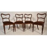 A set of 4 Victorian 19th century balloon back mahogany dining chairs. Raised on shaped supports