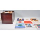 A large collection of 45's to include various years and artists. To include Elton John, The