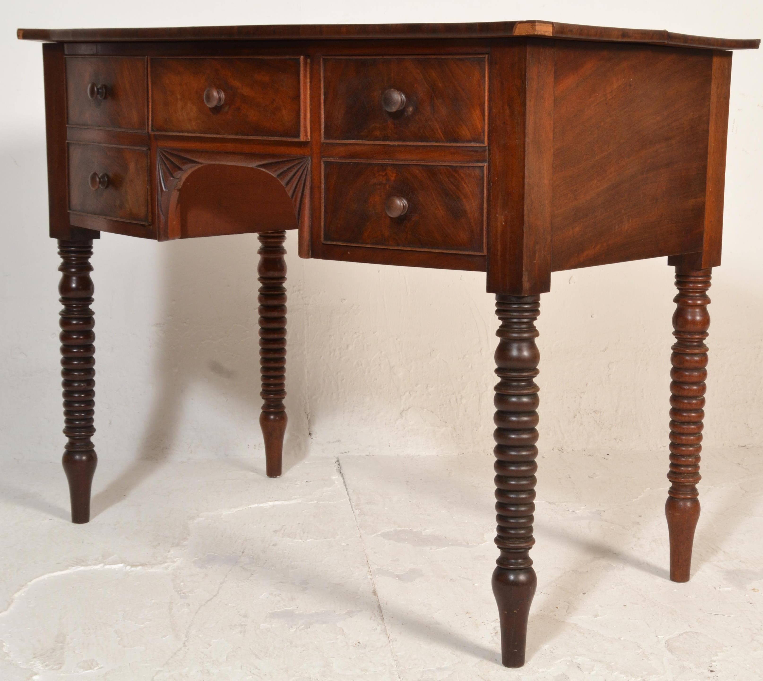A 19th century George III mahogany bow fronted writing table desk. Raised on bobbin supports - Image 6 of 7