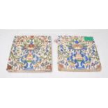 A matching pair of 19th Century polychrome earthenware tiles with urn and floral decoration. Each