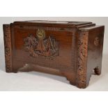 A mid century Chinese / Singapore camphorwood blanket box chest having carved decoration in relief