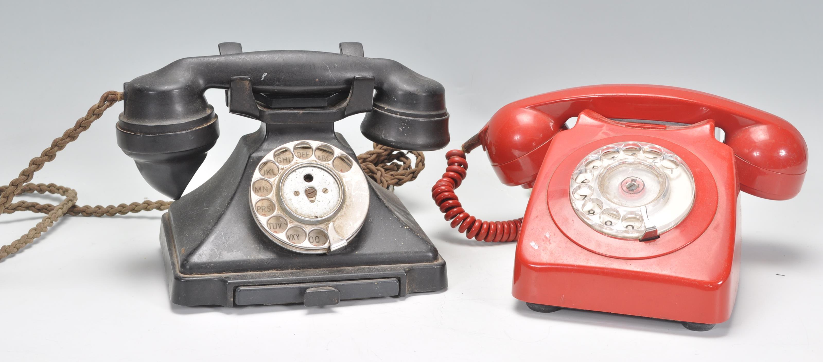 Two vintage 20th Century ring dial telephones to include a black bakelite example and a red