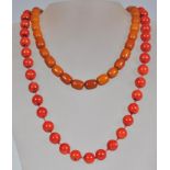 A vintage 20th Century beaded coral necklace having 29 round beads. Red strung with a spring ring