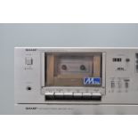 Hi-Fi - A Sharps part stacking system comprising a Stereo Cassette Deck RT-21, Integrated Stereo